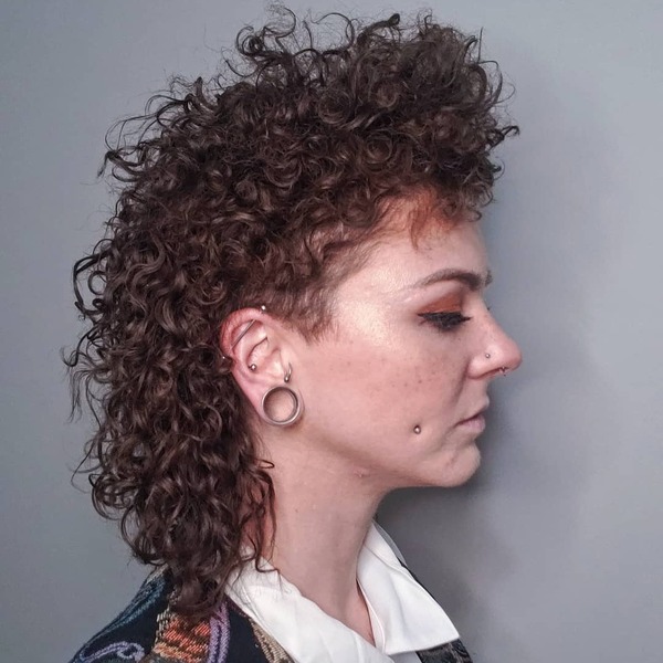The Perm Hairstyle- a woman wearing a black blouse