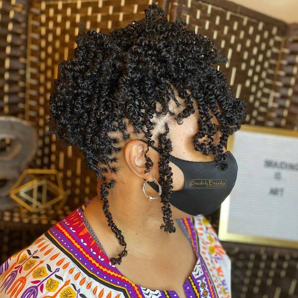 Tiny Twists Protective Hairstyles for Black Women- a black woman wearing a black face mask