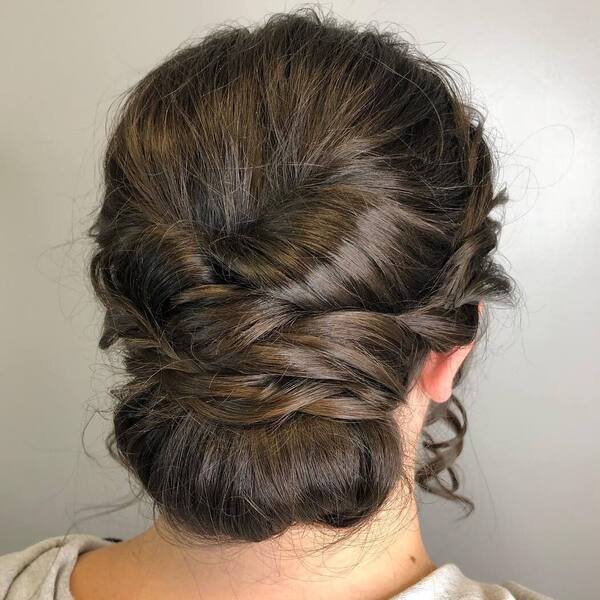 Twisted Updo for Medium Hair- a woman wearing gray jacket