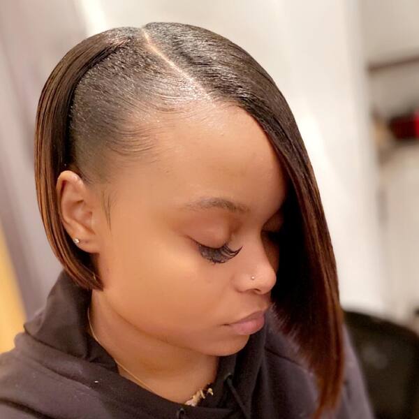 Uneven Bob Cuts - a woman in a side view