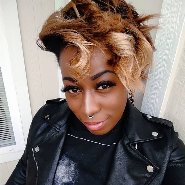 Vertical Pixie Curls- a woman wearing a black leather jacket