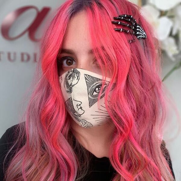 Wavy Pink Strands- a woman wearing a face mask