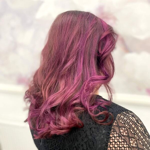 Long Layered Hairstyle for Purple Hair - a woman wearing a dress in a back view